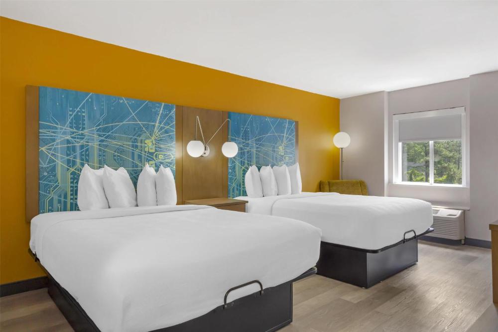Queen Suite with Two Queen Beds and Sofa Bed interior